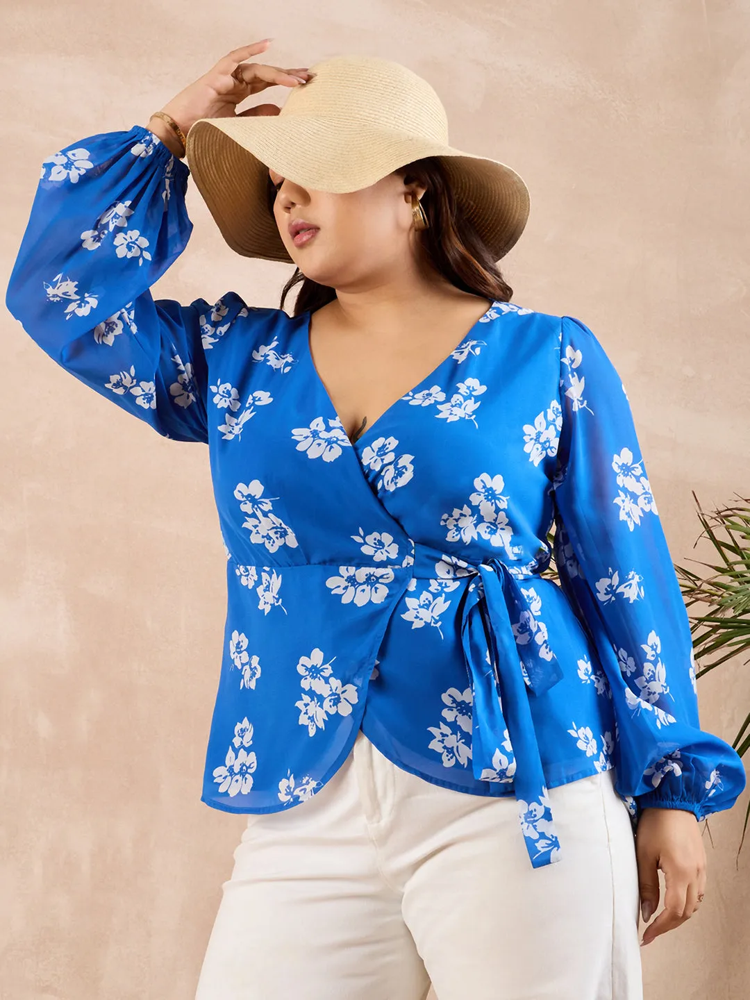 Berrylush Curve Women Blue & White Floral Printed V-Neck Bishop Sleeves Waist Tie-Up Wrap Regular Top