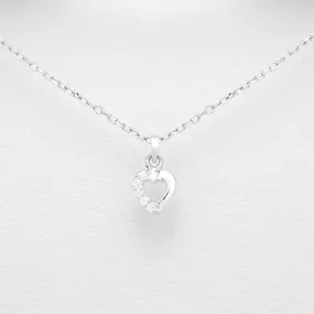 Children's Sterling Silver Heart Pendant Half Set With Cubic Zirconium.