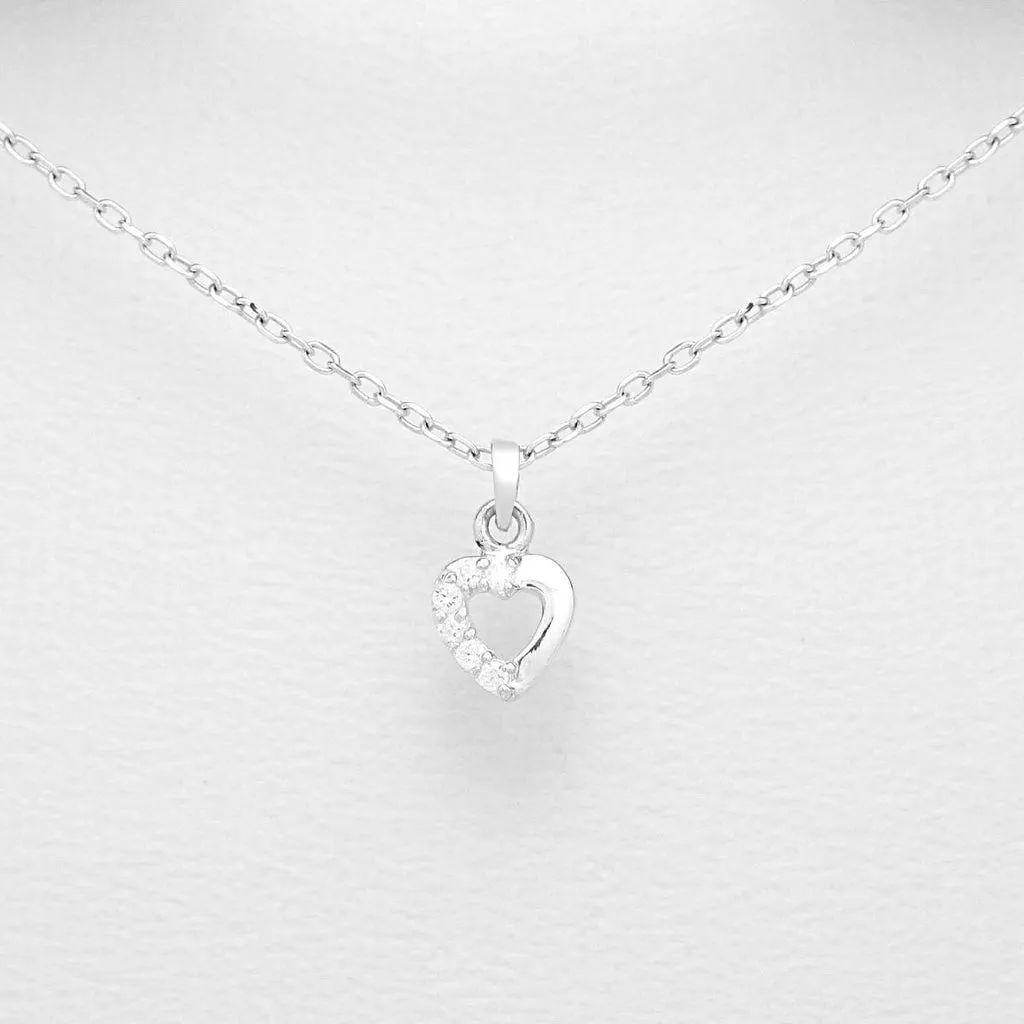 Children's Sterling Silver Heart Pendant Half Set With Cubic Zirconium.