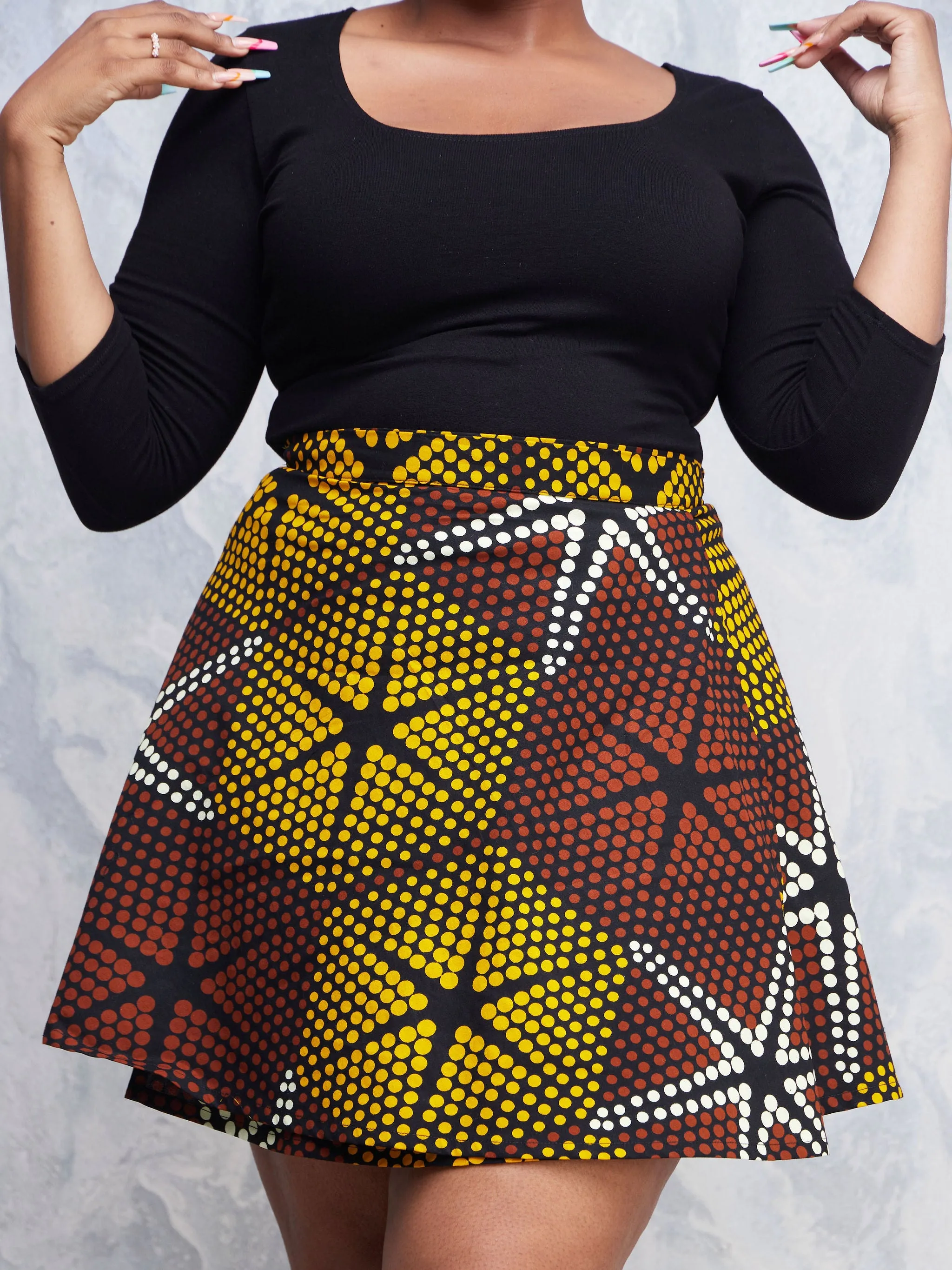 Nimali Mini A-Line Skirt - Black / Yellow Polka Ankara